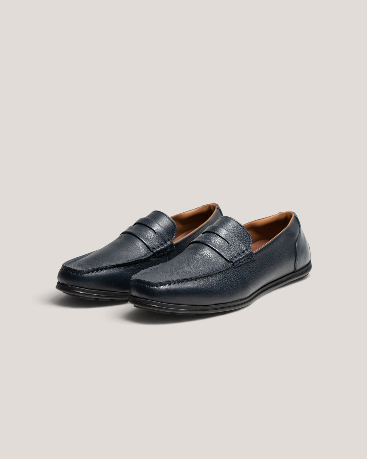 NEGRONI WEB STOREのネイビーカラーのレザー製ワイルドペニーⅢドライビングシューズ。上品な質感のペニーローファーデザイン。